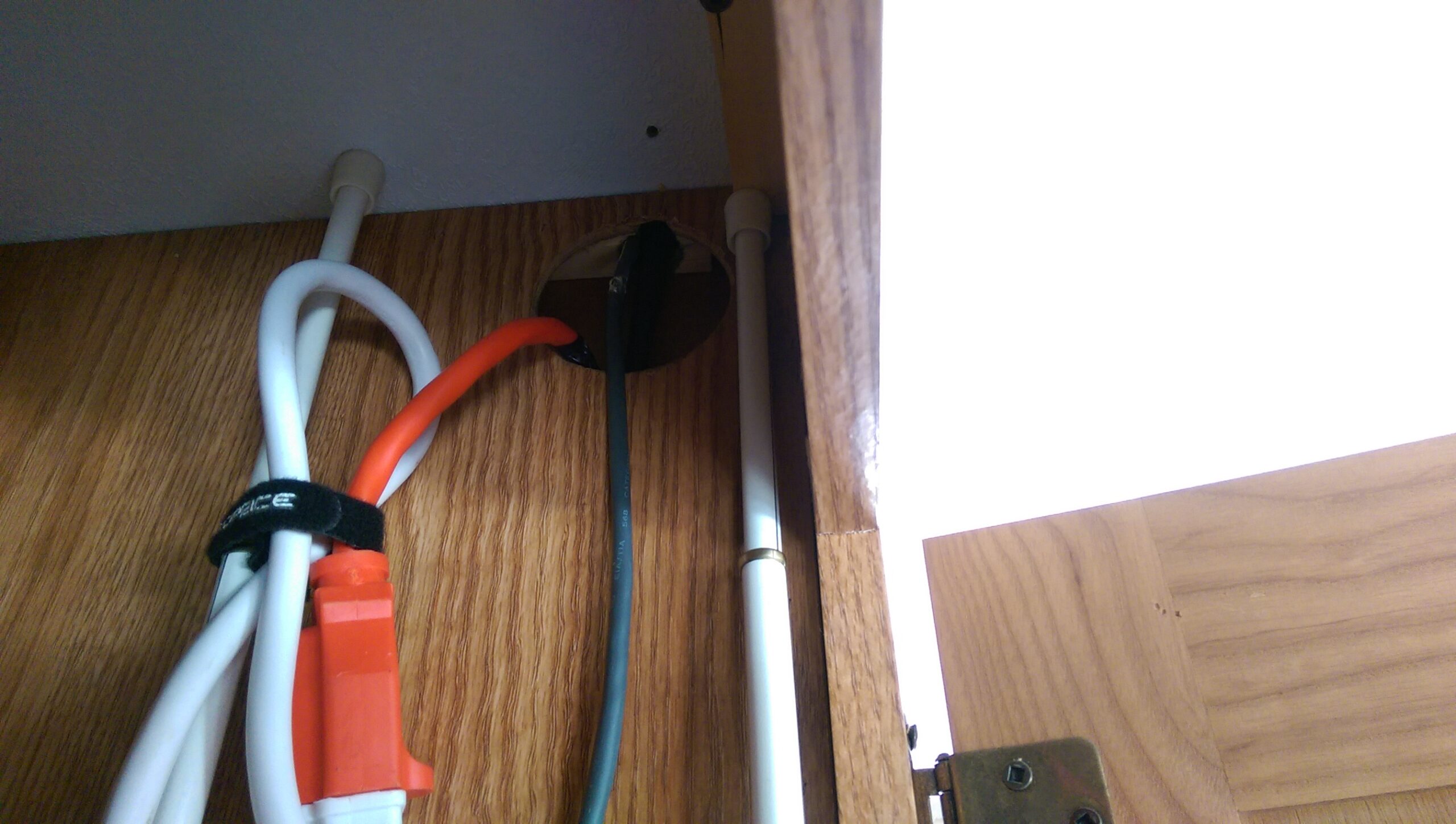 Photo of Solar and Network Wiring in Cabinet
